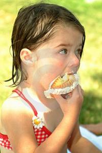 girl eating cupcake